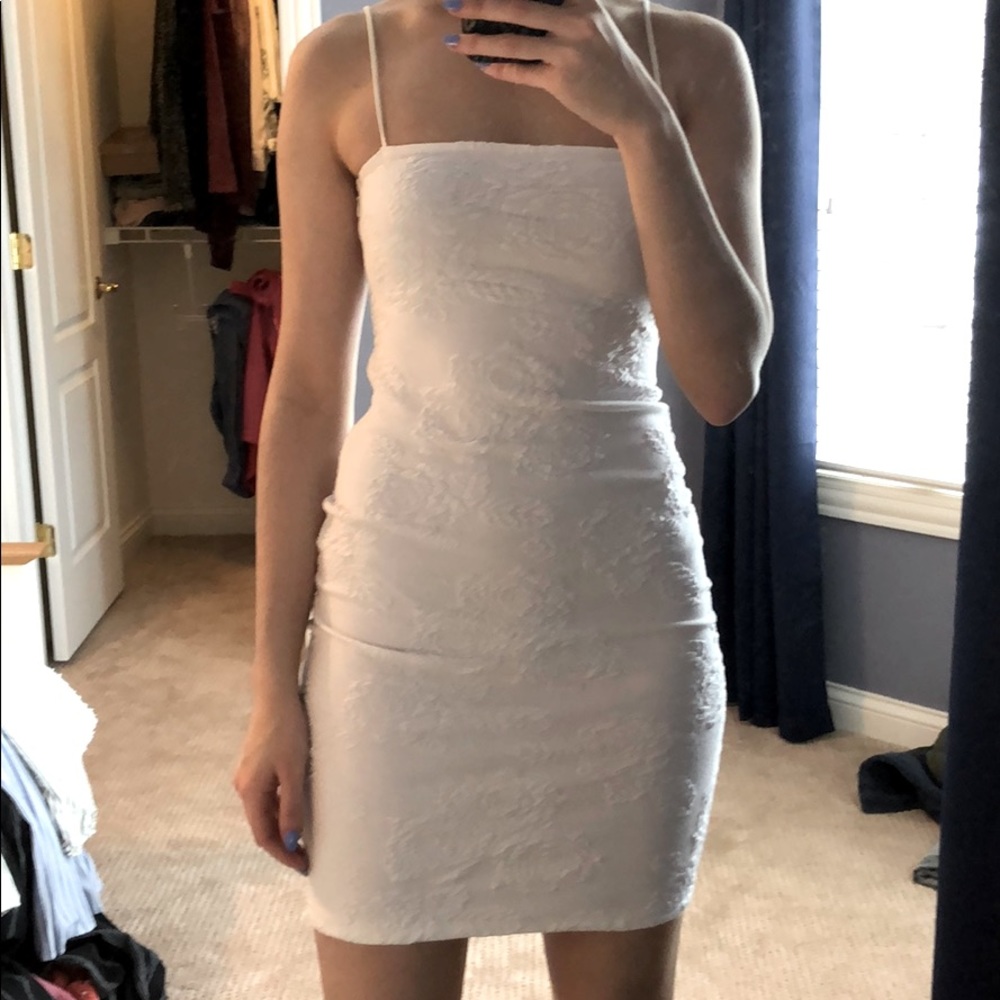 White rose-printed form fitting dress